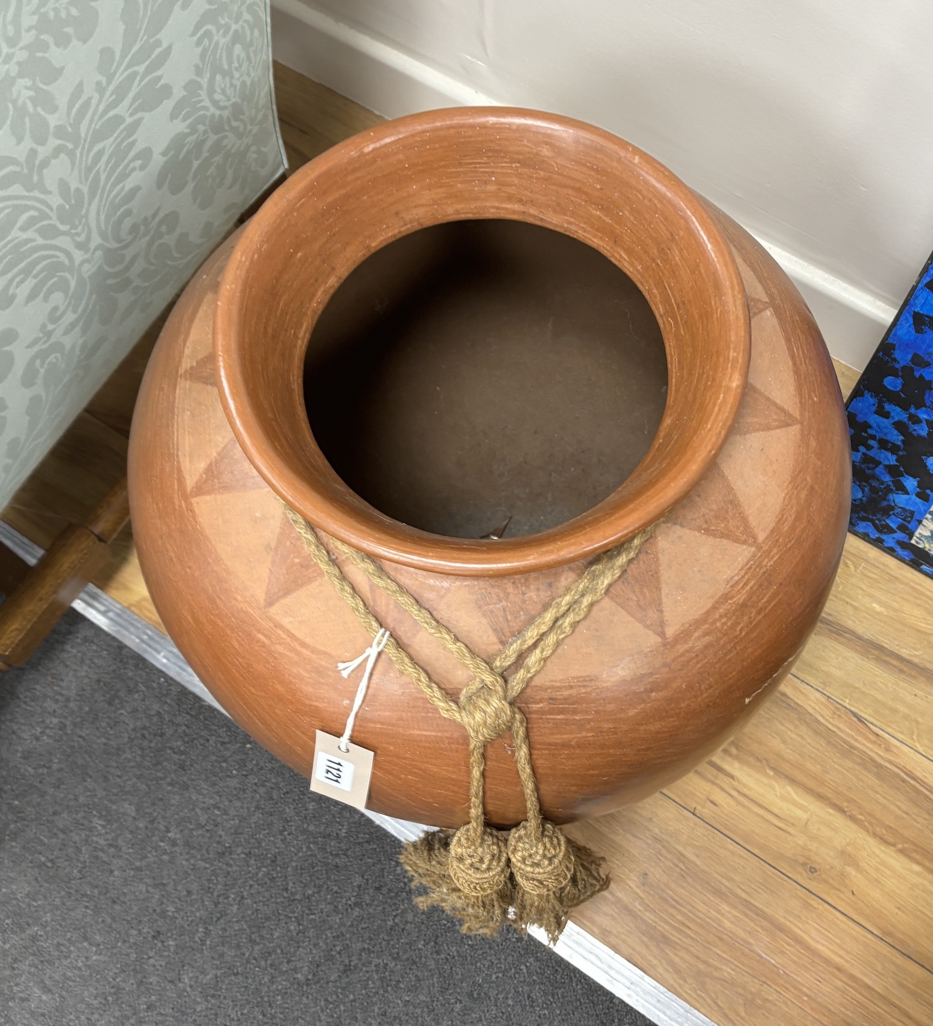 A large glazed earthenware urn, height 54cm